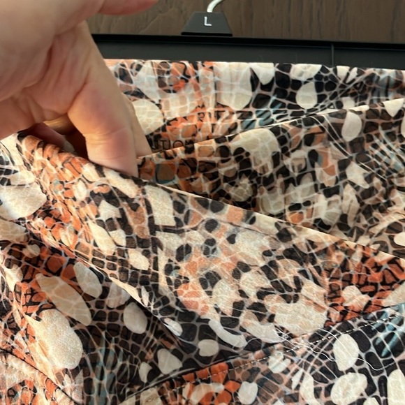 Evolution and Creation orange/cream/black patterned athletic pants. Size Large. - Picture 2 of 6